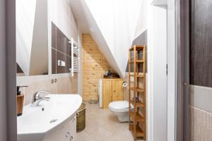Kúpeľňa v ubytovaní Apartamenty Rodzinne II ApartZakop