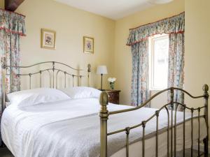 מיטה או מיטות בחדר ב-Bransdale