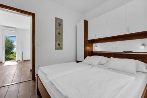 Postel nebo postele na pokoji v ubytování Villa Natura Makarska