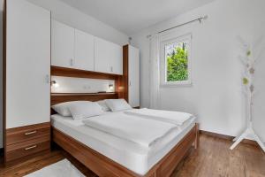 Postel nebo postele na pokoji v ubytování Villa Natura Makarska + 37 fotografií