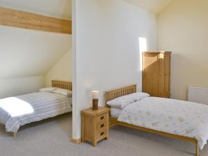 Krevet ili kreveti u jedinici u okviru objekta Kingfisher Lodge
