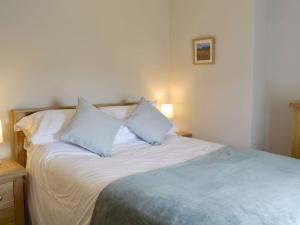 Cama o camas de una habitación en Weavers Cottage