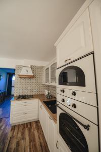 Kuchyňa alebo kuchynka v ubytovaní Apartament Zielony Ruczaj w Cisnej