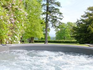 a pool of water in the middle of a road at Summer House in St Asaph