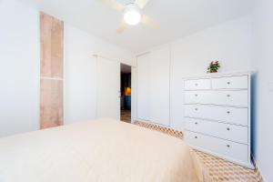Posteľ alebo postele v izbe v ubytovaní Apartamento Torresol
