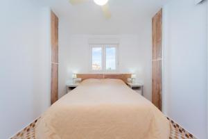 Posteľ alebo postele v izbe v ubytovaní Apartamento Torresol