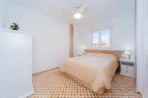 Posteľ alebo postele v izbe v ubytovaní Apartamento Torresol + 20 fotografií