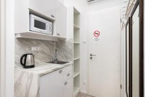 Kuchyňa alebo kuchynka v ubytovaní Delta Apartments Budapest