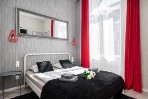 Posteľ alebo postele v izbe v ubytovaní Delta Apartments Budapest