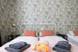 Posteľ alebo postele v izbe v ubytovaní Delta Apartments Budapest