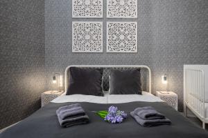 Posteľ alebo postele v izbe v ubytovaní Delta Apartments Budapest