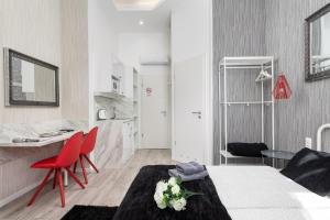 Posteľ alebo postele v izbe v ubytovaní Delta Apartments Budapest