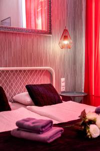 Posteľ alebo postele v izbe v ubytovaní Delta Apartments Budapest