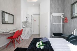 Posteľ alebo postele v izbe v ubytovaní Delta Apartments Budapest