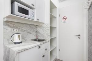 Kuchyňa alebo kuchynka v ubytovaní Delta Apartments Budapest