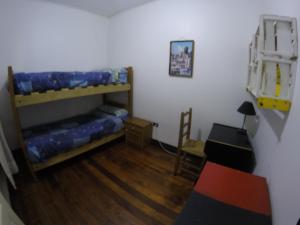 Postel nebo postele na pokoji v ubytování Lemuria Hostel