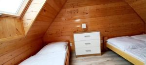 Łóżko lub łóżka w pokoju w obiekcie Ośrodek 9Amber