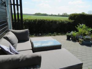 Zahrada ubytování Vakantiewoning De Klaproos + 24 fotografií