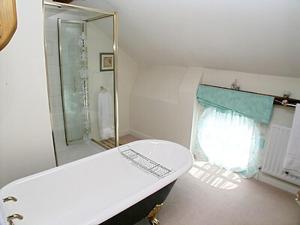 Een badkamer bij Wee Bridge Farm Cottage