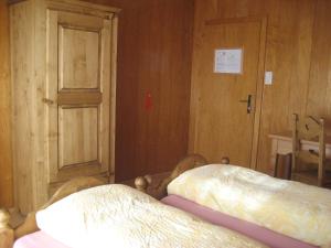 Letto o letti in una camera di Logis de la Licorne