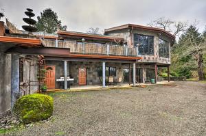 a large house with a balcony on top of it at Willamette Valley Apt - Surrounded by Wineries! in Newberg