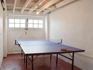 a ping pong table in the middle of a room at Sea Breeze in The Mumbles
