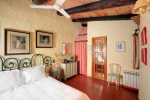 Cama o camas de una habitación en Cortijo La Hoya
