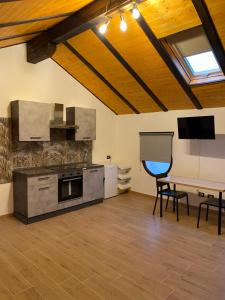 Kuchyň nebo kuchyňský kout v ubytování 21House - Appartamento 2