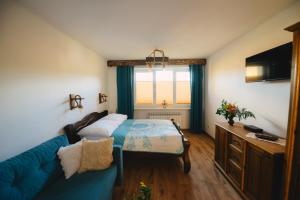 Posteľ alebo postele v izbe v ubytovaní Apartament Zielony Ruczaj w Cisnej