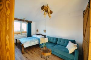 Posteľ alebo postele v izbe v ubytovaní Apartament Zielony Ruczaj w Cisnej
