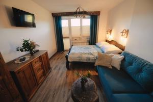 Posteľ alebo postele v izbe v ubytovaní Apartament Zielony Ruczaj w Cisnej