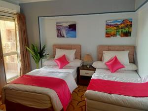 Postel nebo postele na pokoji v ubytování فاكانزا شقة فندقية مفروشة- vacanze