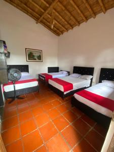 Postel nebo postele na pokoji v ubytování Finca Hotel Cabaña Fercho