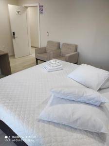 Ein Bett oder Betten in einem Zimmer der Unterkunft Hotel Serrano