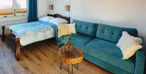 Posteľ alebo postele v izbe v ubytovaní Apartament Zielony Ruczaj w Cisnej