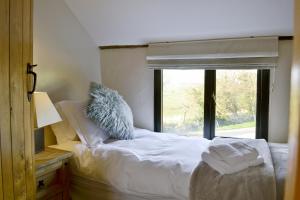Posteľ alebo postele v izbe v ubytovaní The Cart Lodge-e3568