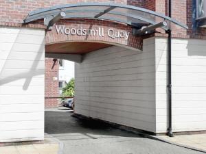 a garage door with a sign that reads woodmill city at Jorvik- Woodsmill Quay in York