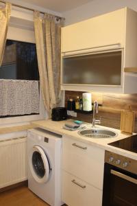 Köök või kööginurk majutusasutuses HomeW4 - Tiny Apartment