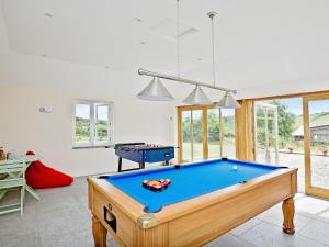 a living room with a pool table in it at Lower Trevorder Barn-tt2 in Warleggan