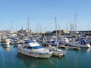 a bunch of boats are docked in a marina at Rons House in Broadstairs