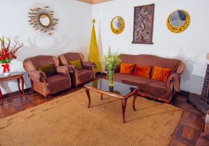 Posezení v ubytování Centenario Inn