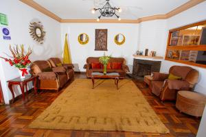 Posezení v ubytování Centenario Inn