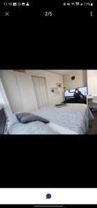 a picture of a bedroom with a bed in a room at Fraiser Homes in Brampton