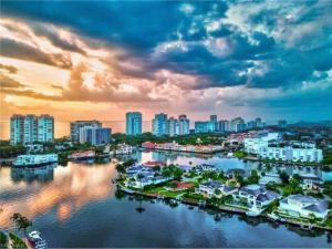 a view of a city with a harbor and buildings at Naples Dream at WTC with Heated Pool SPA Sauna 7 bicycles and 3 mls to beach in Naples