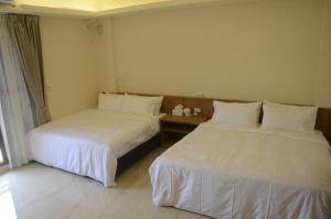 Postel nebo postele na pokoji v ubytování Rebecca Hostel