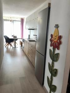 A kitchen or kitchenette at Apartmán LUNA Tále Chopok Jasna Juh