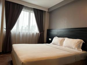 Postel nebo postele na pokoji v ubytování Signature Hotel + 21 fotografií
