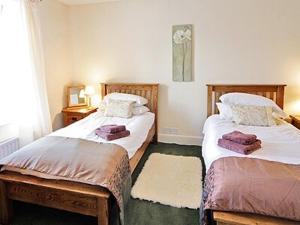 Ένα ή περισσότερα κρεβάτια σε δωμάτιο στο Glendower