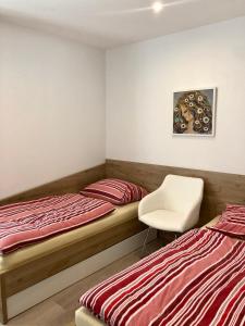 A bed or beds in a room at Apartmán LUNA Tále Chopok Jasna Juh