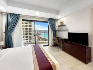 TV/trung tâm giải trí tại Gold Coast Luxury Apartment Nha Trang